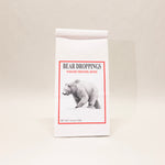 Packaging of 'Bear Droppings' yogurt pretzel bites with a bear illustration on a beige background