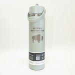 Light teal water bottle with text and a cow silhouette on a white background