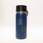 Blue thermos with black lid on a white background