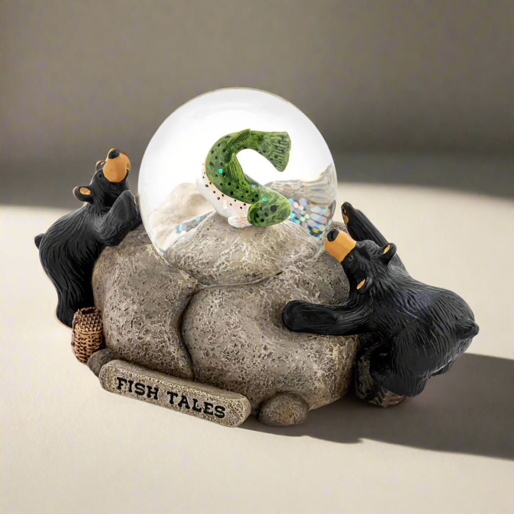 Gnome figurine with a snow globe on a white background