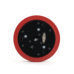 bottom of figurine on a white background