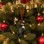 Black bear ornament with cubs on a white background