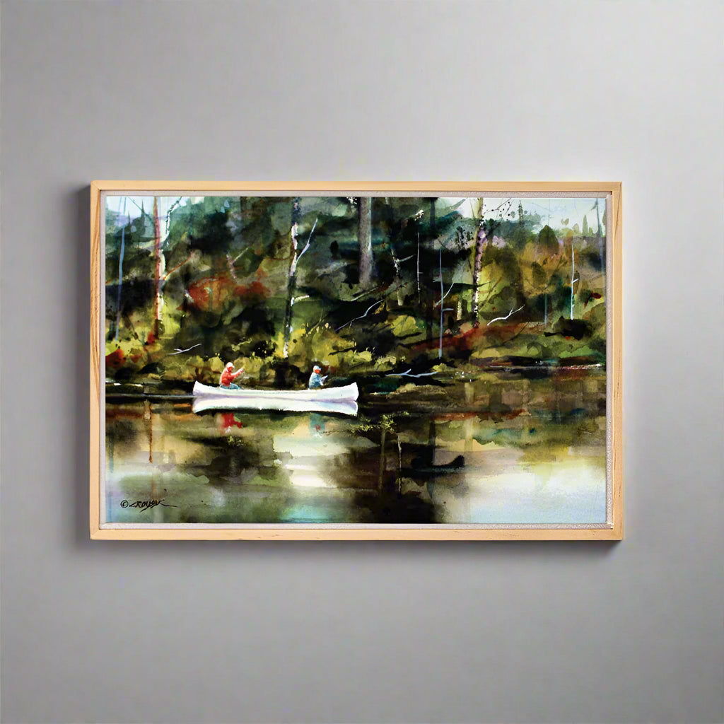 Dean Crouser Montana Wall Art, Two fisherman canoeing on a reflective river in a forest