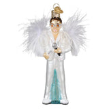 Decorative ornament of a performer in a white outfit with a microphone on a white background