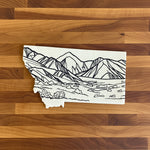 Mountain landscape design on a white card with a wooden surface background