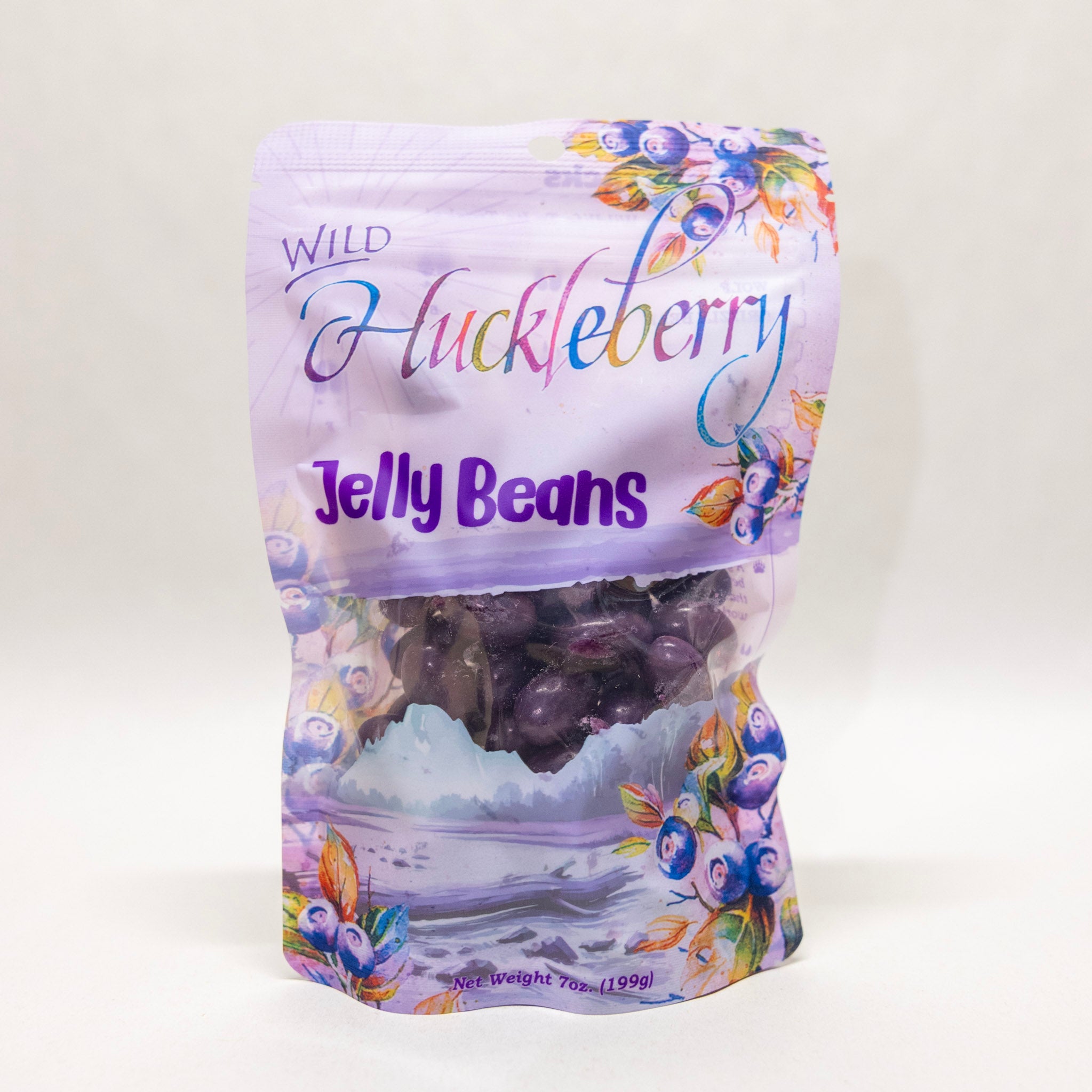Bag of Wild Huckleberry Jelly Beans with colorful packaging on a white background