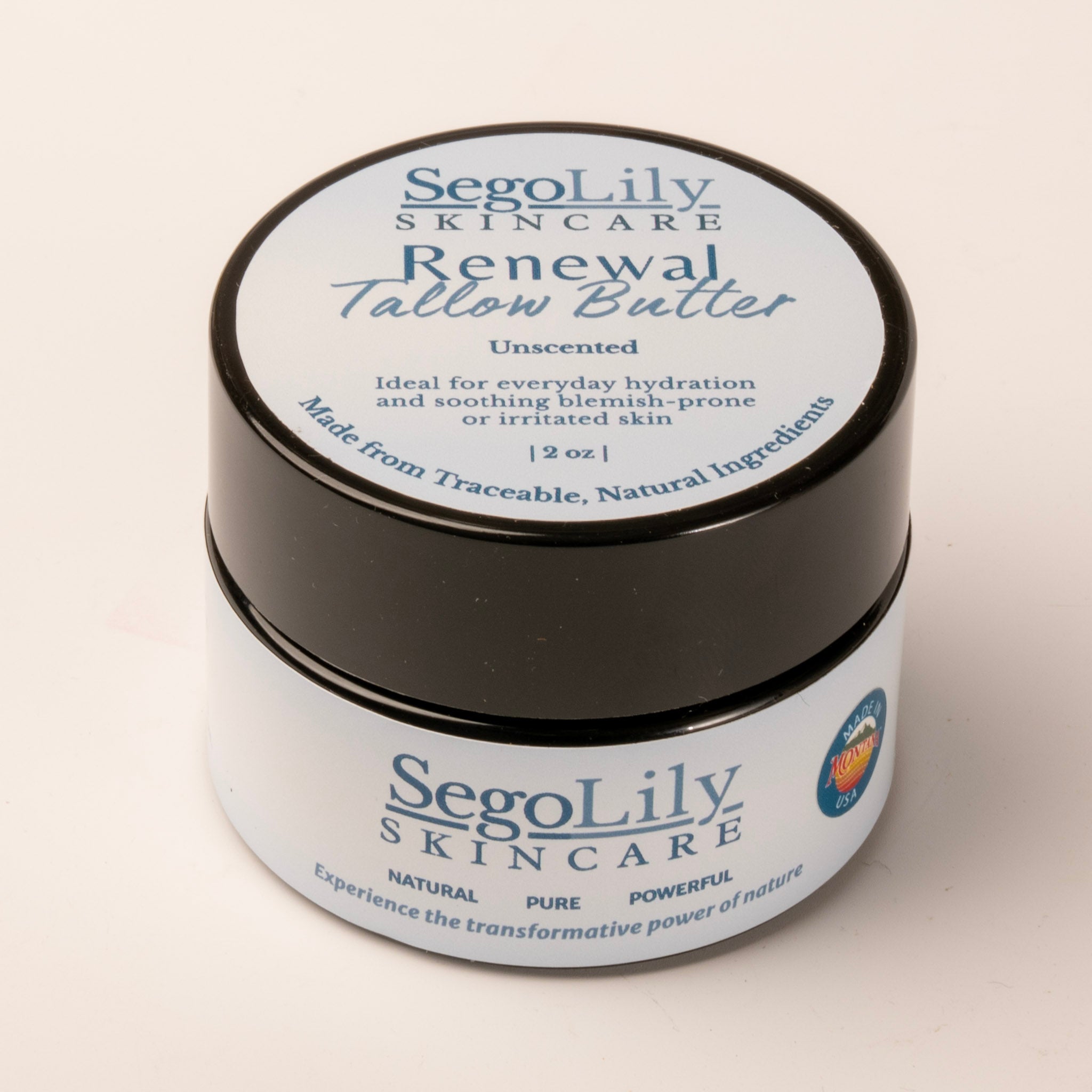 SenoLily Skincare Renewal Tallow Butter jar on a beige background