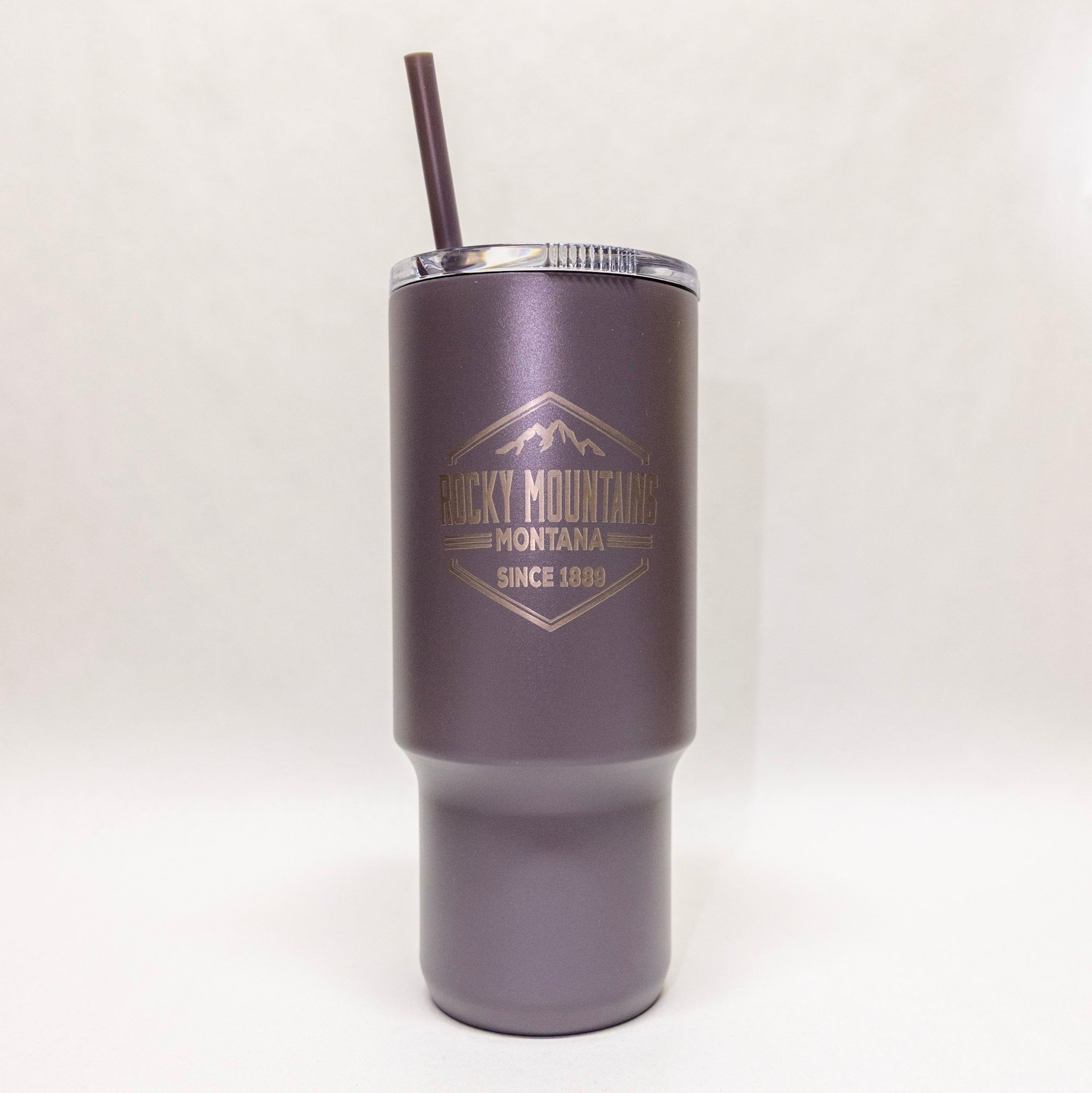 Gray tumbler with a logo on a white background
