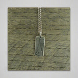 Silver Howl Necklace by Daphne Lorna