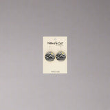 Two-Tone Mountain Dangle Earrings by Nature Cast Metalworks