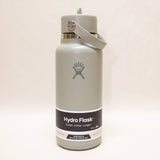 Hydro Flask water bottle with gray cap on a white background