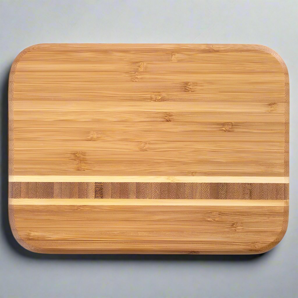 Want to make an impression when you're cutting and serving? Look no further than the Barbados Bar Cutting Board by Totally Bamboo!