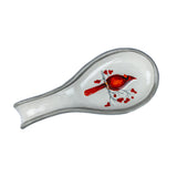 The Birch Cardinal Spoon Rest by Transpac Imports will help keep your kitchen clean and neat, while also adding a festive touch!