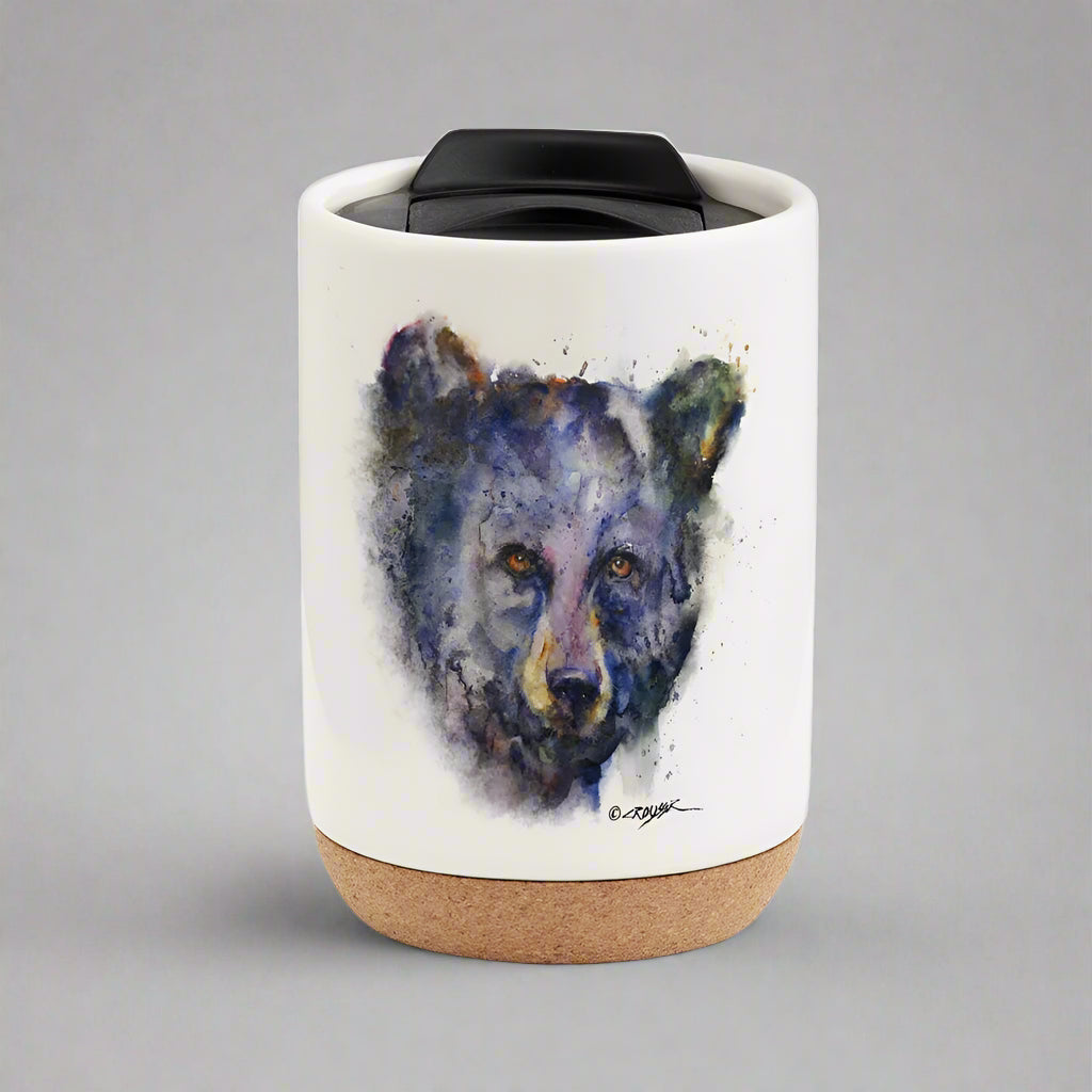 Enjoy the colorful and stylish art of Dean Crouser while you sip a warm drink with the Dean Crouser Cork Bottom Bone Tumbler by Demdaco.