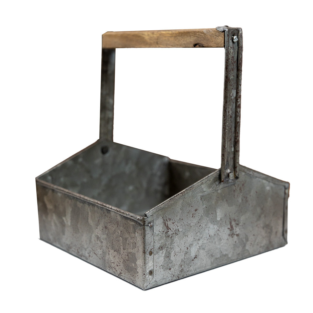 The Garden Beverage Napkin Caddy by Park Designs features the most adorable tin holder with a swinging handle for easy access!