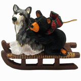 Bear and Sled Dog Bearfoots Ornament by Jeff Fleming