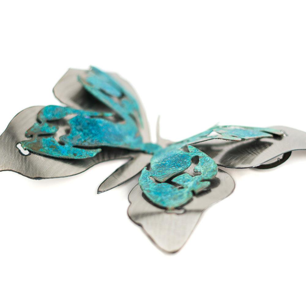 Everyone loves the springtime. The flowers start to bloom, the trees are waking up and the birds come home! Not only do the birds appear, but so do the butterflies! This Large Patina Monarch Butterfly Wall Art by H&K Studios brings the serenity of butterflies to your home.