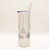 Tumbler with Christmas ornament design on a white background