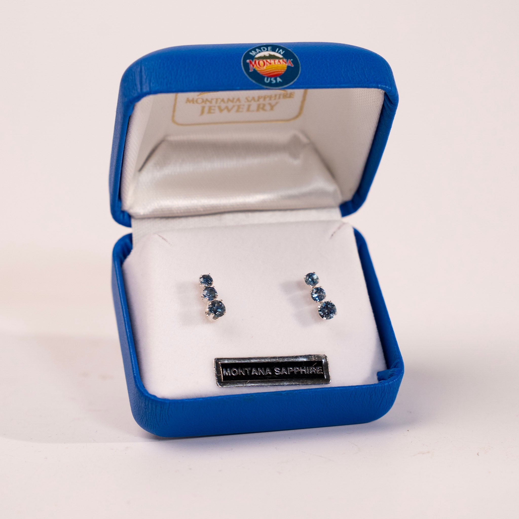 Three Stone Four Prong Montana Sapphire Earrings by Mac's Gems
