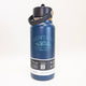 Blue water bottle with 'Montana Big Sky Country' branding on a white background