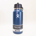 Blue Hydro Flask water bottle on a white background