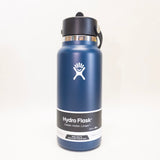 Blue Hydro Flask water bottle on a white background