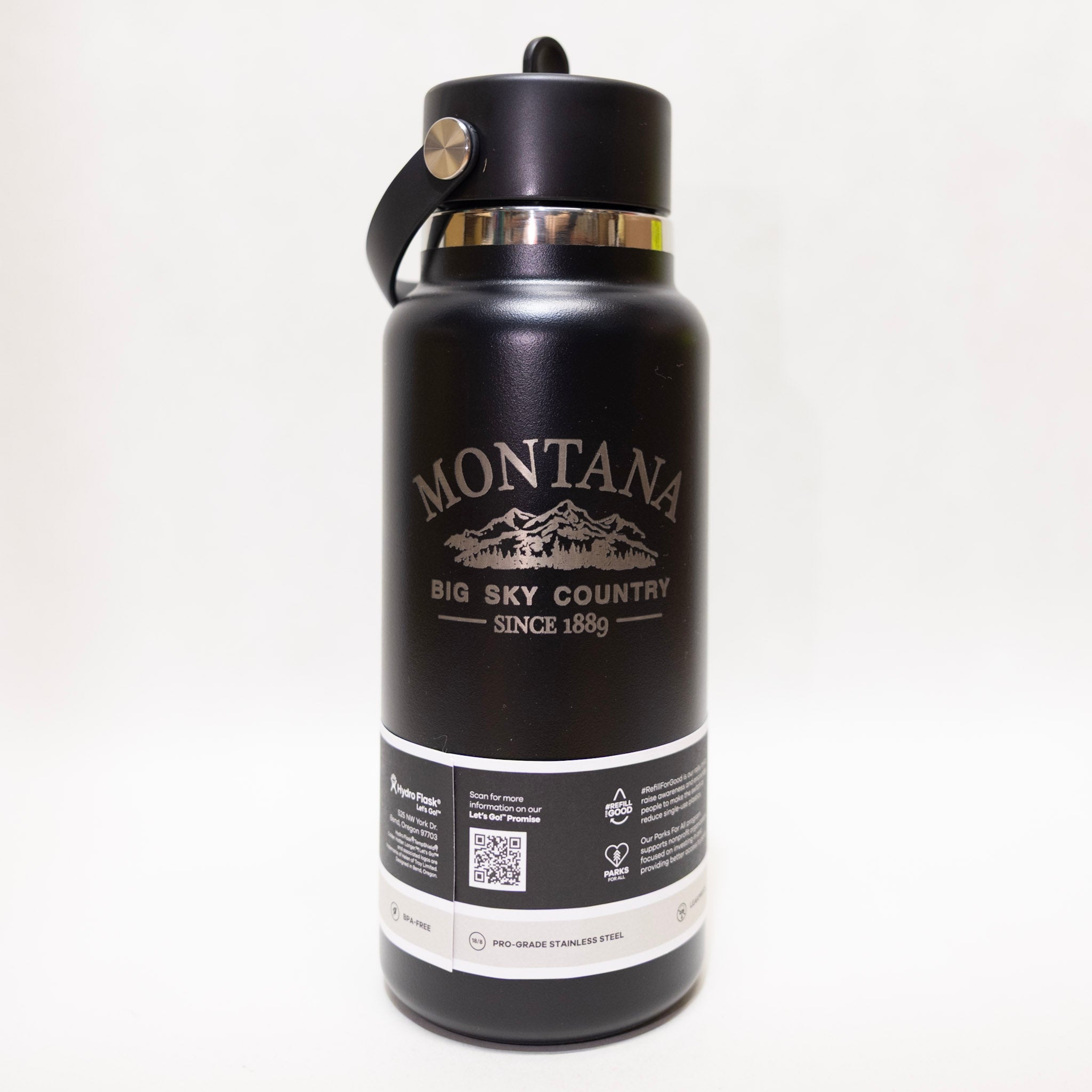 Black water bottle with 'Montana Big Sky Country' branding on a white background