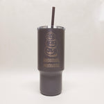 Dark gray tumbler with Halloween design and 'Bozeman, Montana' text on a white background