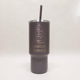 Dark gray tumbler with Halloween design and 'Bozeman, Montana' text on a white background