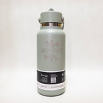 green water bottle with 'Montana' branding on a white background