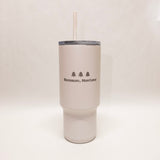 White tumbler with 'Bozeman, Montana' text and tree graphics on a white background