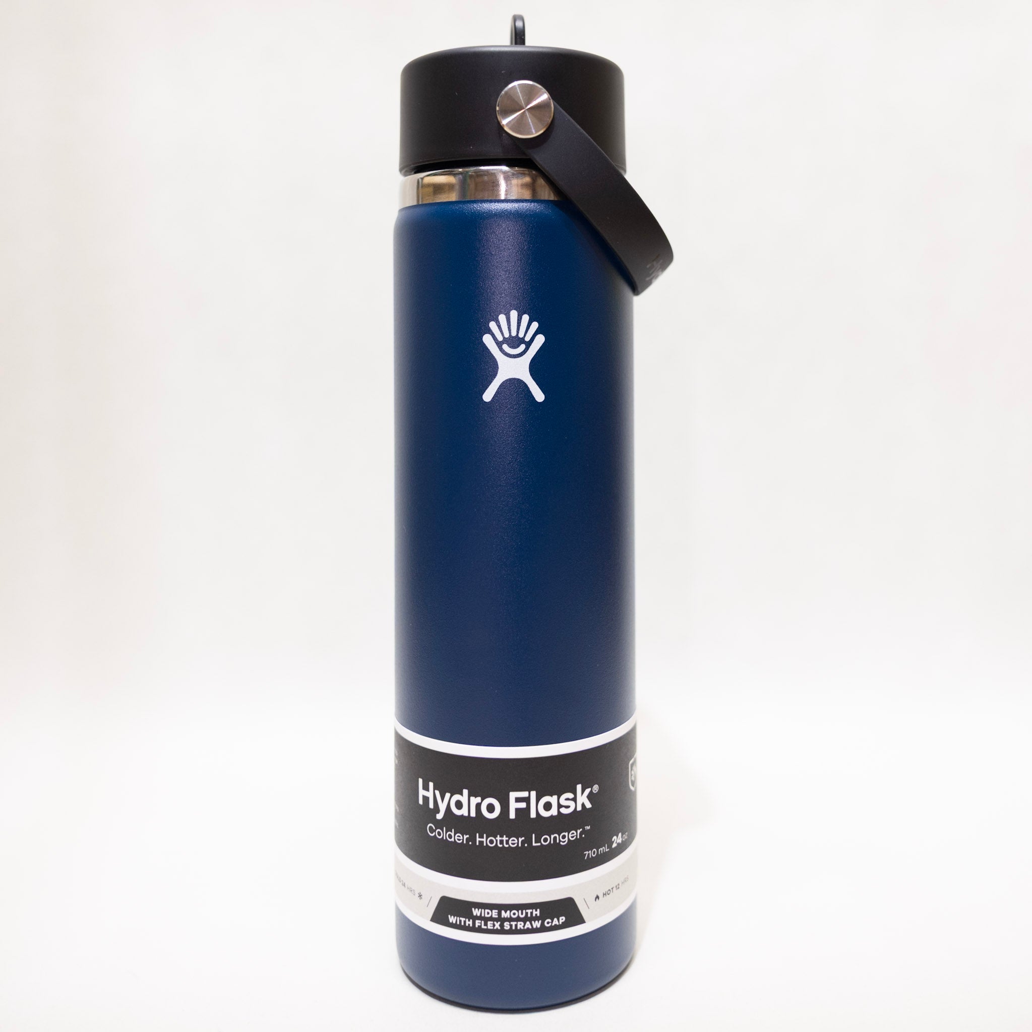 Blue Hydro Flask water bottle with black lid on a white background