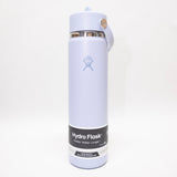 Hydro Flask water bottle with blue lid on a light gray background