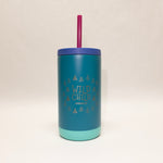 Blue tumbler with 'Wild Child' text and purple straw on a beige background