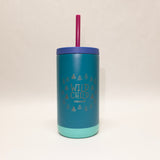 Blue tumbler with 'Wild Child' text and purple straw on a beige background