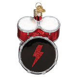 Decorative ornament shaped like a drum set with a red lightning bolt on a white background
