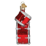 Red glass drum ornament on a white background