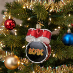 Decorative ornament shaped like a red glittery drum with AC/DC logo