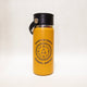 Yellow water bottle with black lid and 'Adventure Awaits' text on a white background