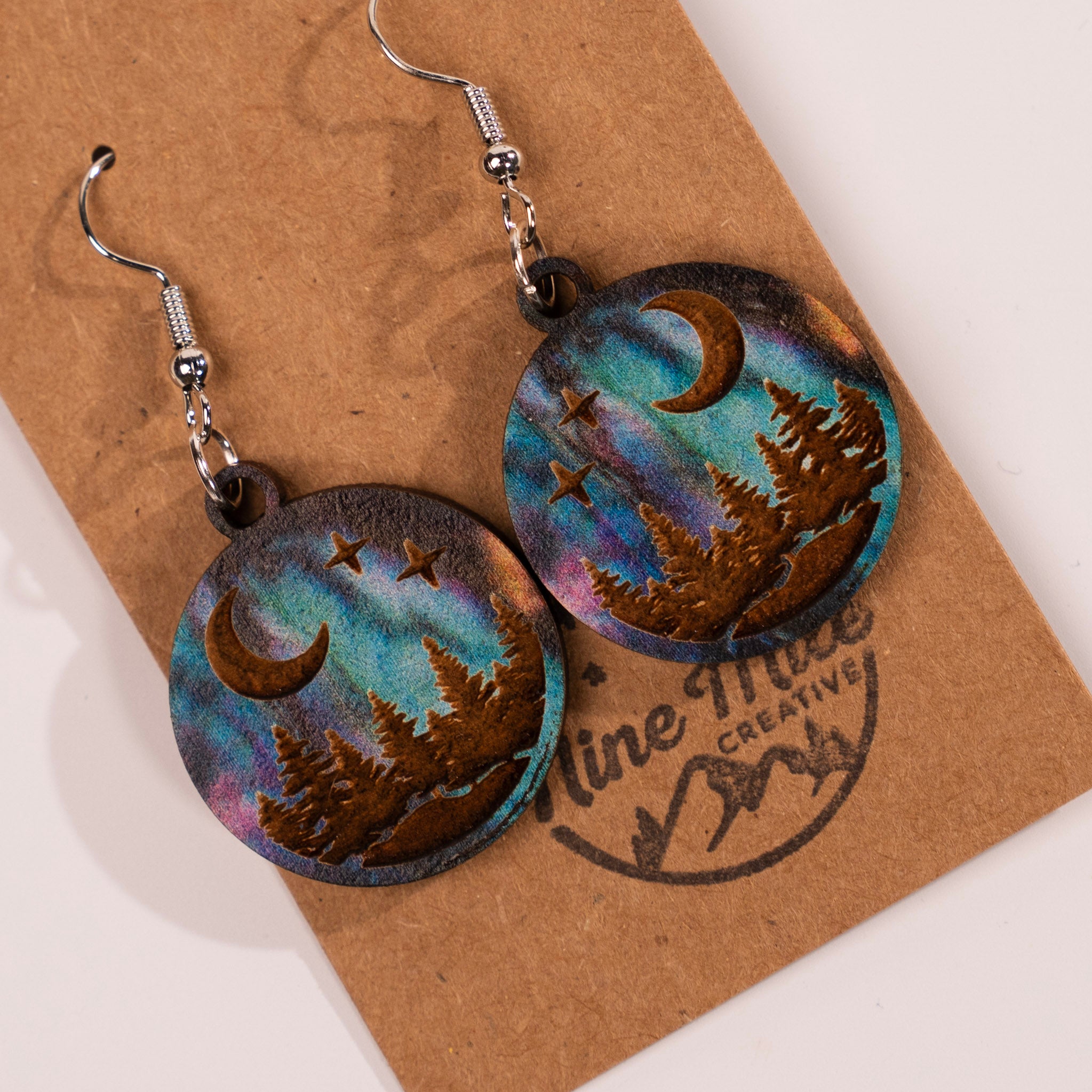 Aurora Moon and Stars Engraved Forest Earrings by Nine Mile Creative