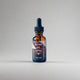 Bottle of beard oil with a dropper on a white background