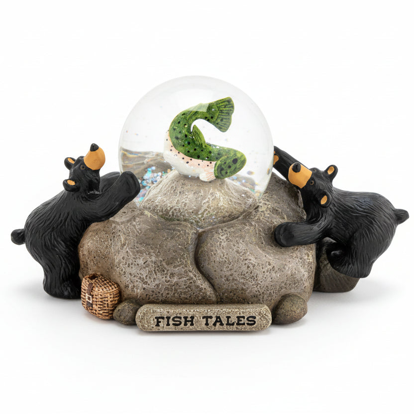 Decorative figurine with two bears and a snow globe labeled 'Fish Tales' on a white background