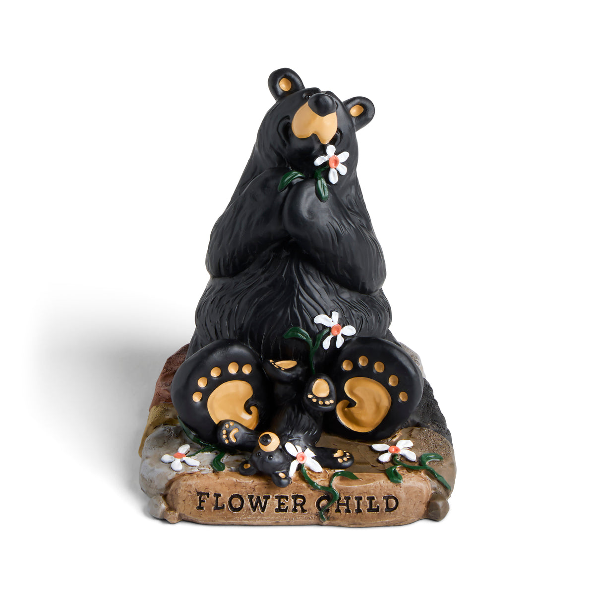 Black bear figurine with cubs holding flowers on a white background