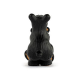 Backside of a black bear on a white background.