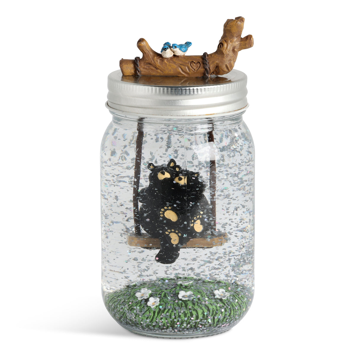 Decorative jar with a black bear on a swing inside, on a white background