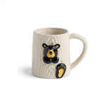 White mug with Bearfoots bear design on a white background