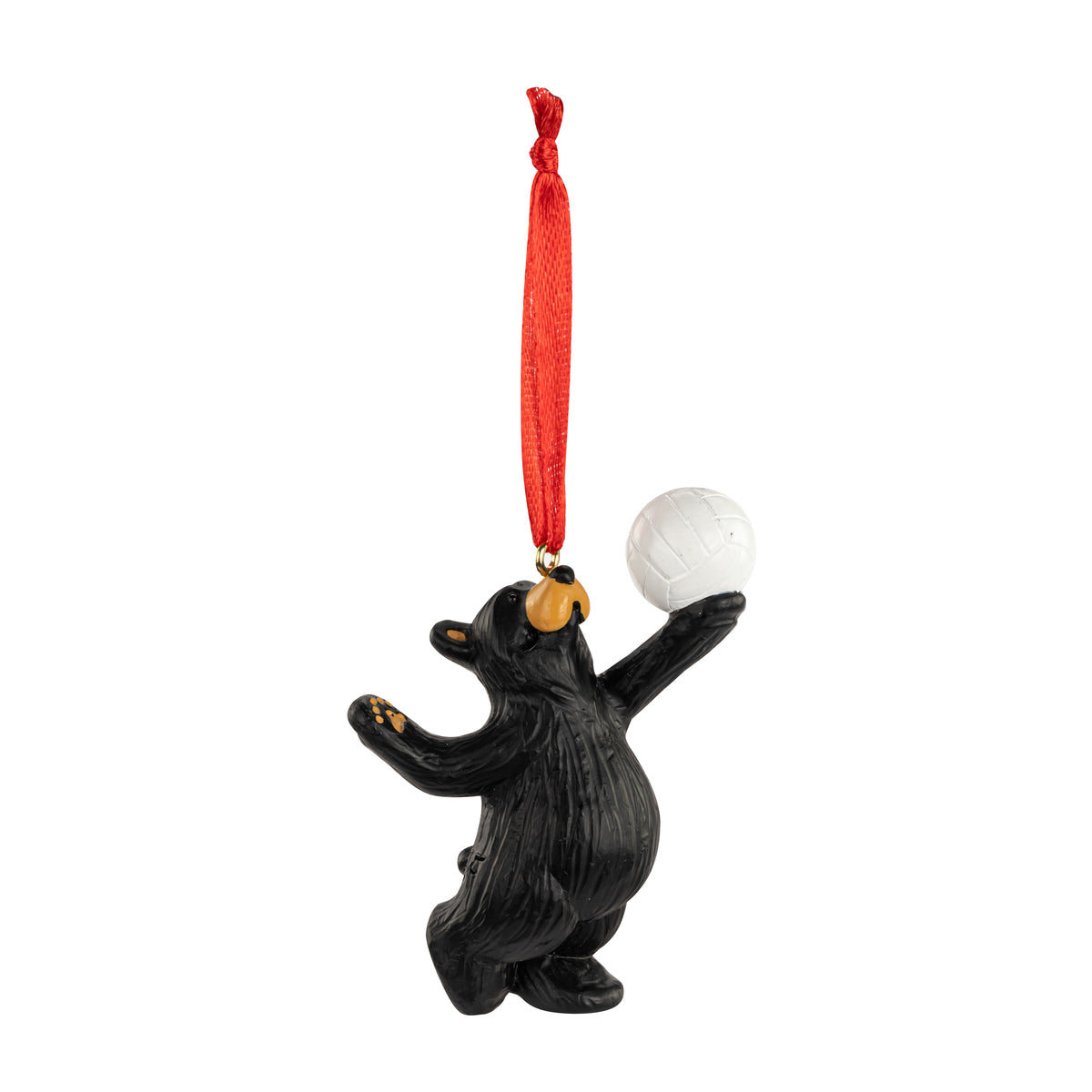 Black bear ornament with a volleyball on a red string against a white background