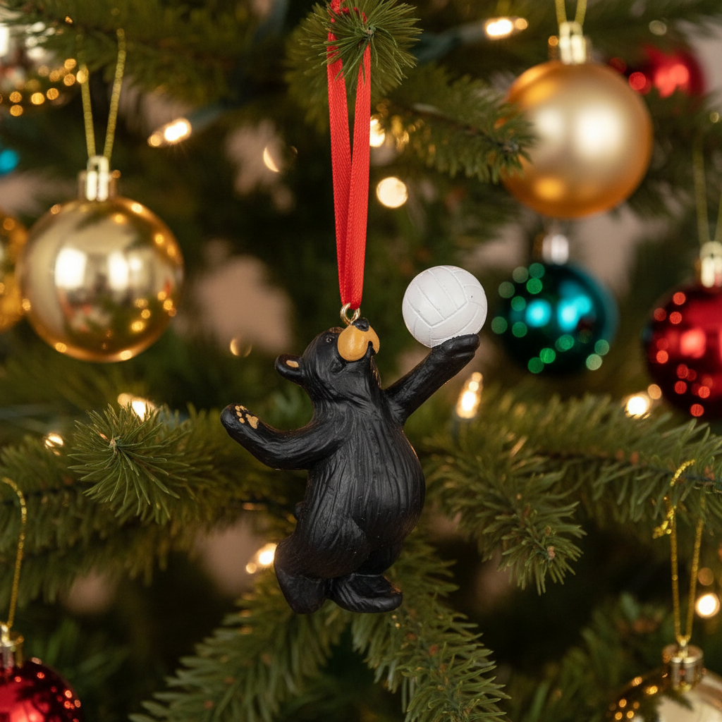 Black bear ornament holding a white ball on a Christmas tree with colorful ornaments.