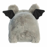 Plush toy with bat-like features on a white background