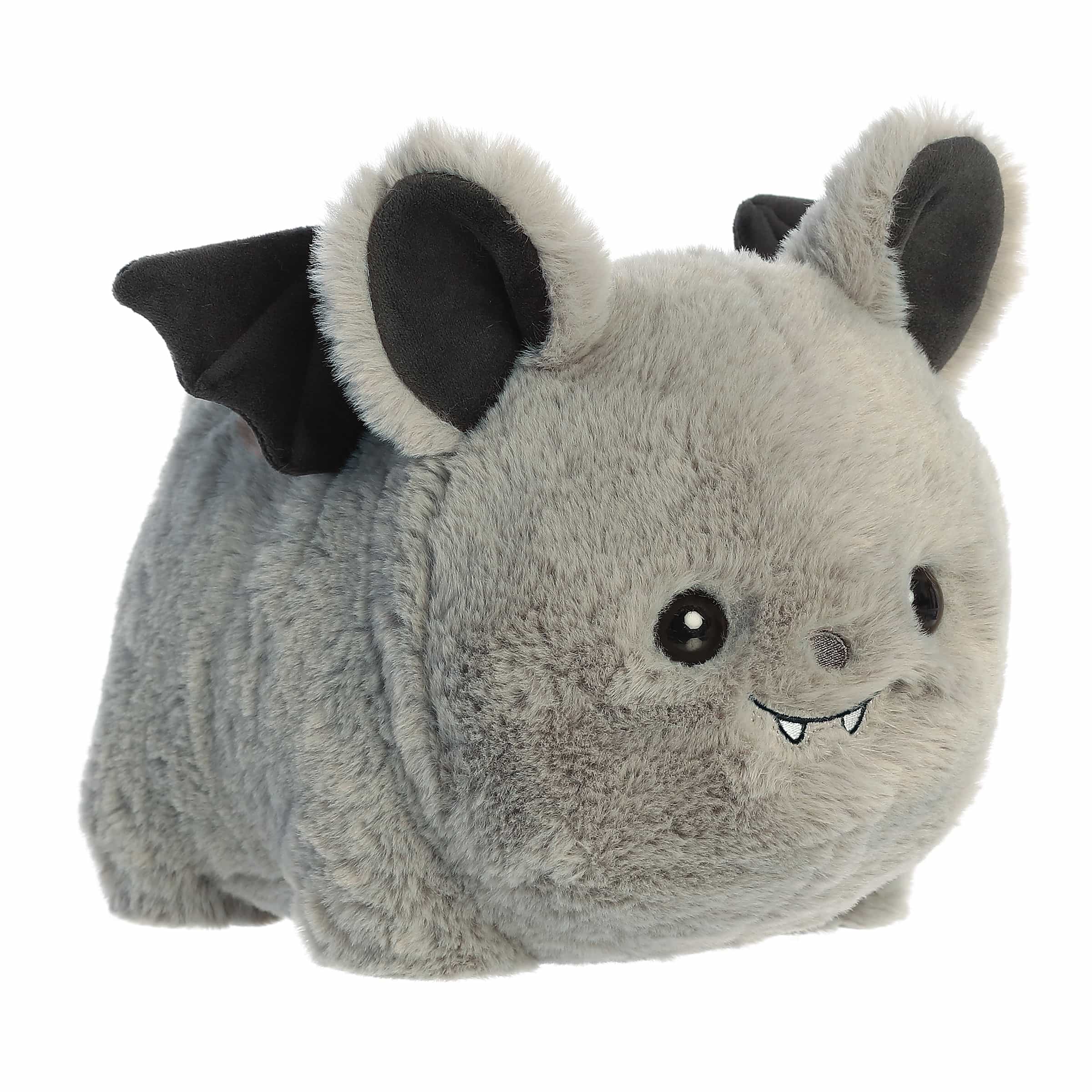 Plush toy with bat-like features on a white background